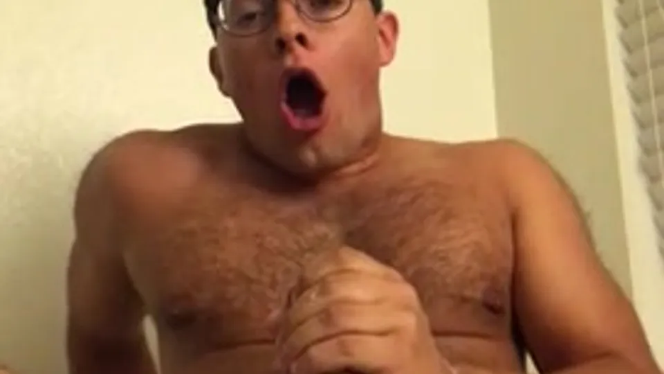 Hairy nerd shoots a big load over his face - ThisVid.com