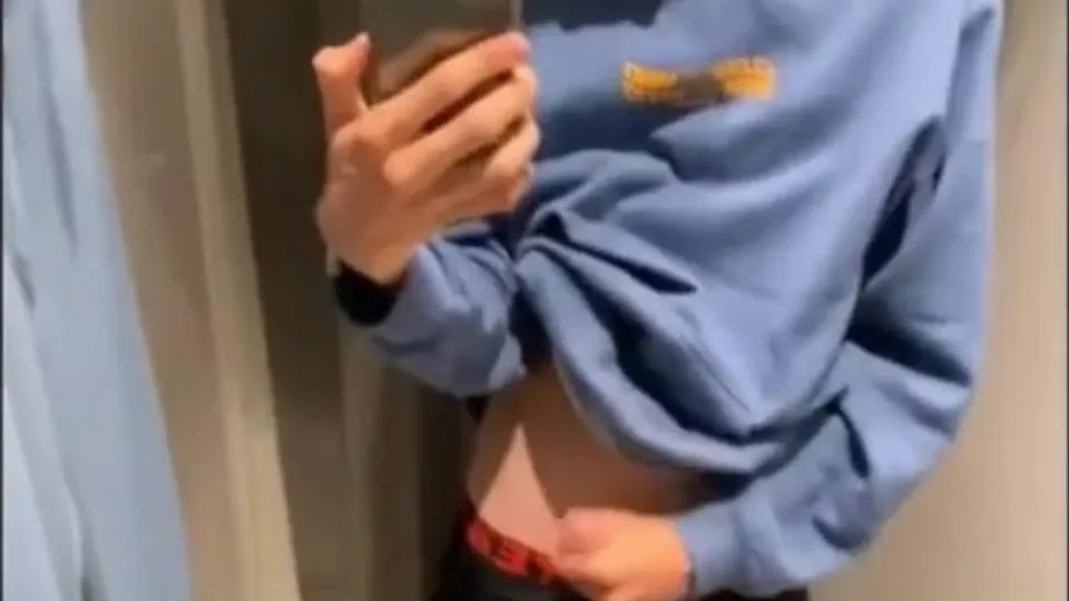 Handjob in shop change-room - ThisVid.com