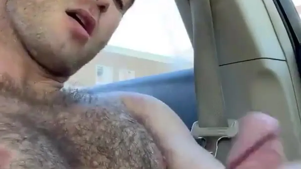 Handsome dude jacking in the car - ThisVid.com