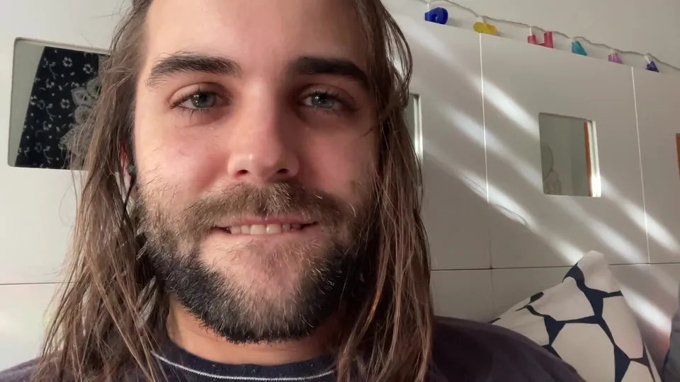 Handsome long haired guy is jerking off - ThisVid.com