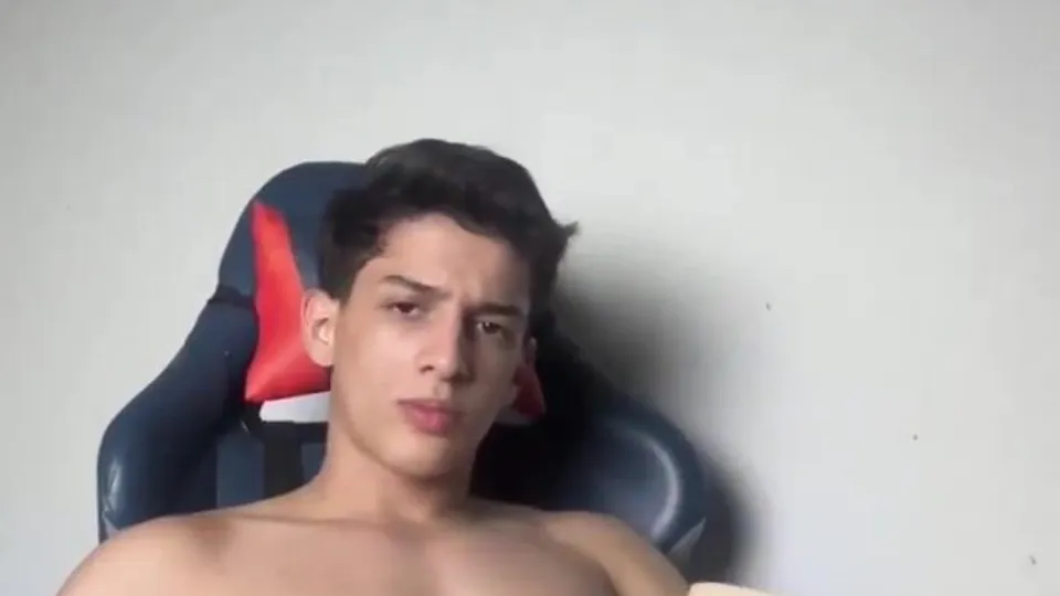 Handsome twink fucking his toy