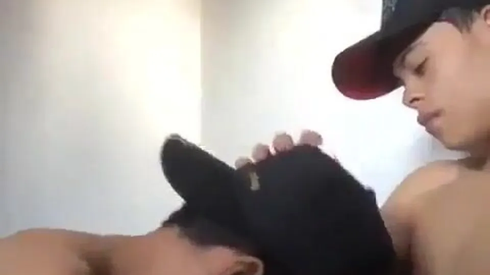 Hat on backwards dude sucks his friend’s dick