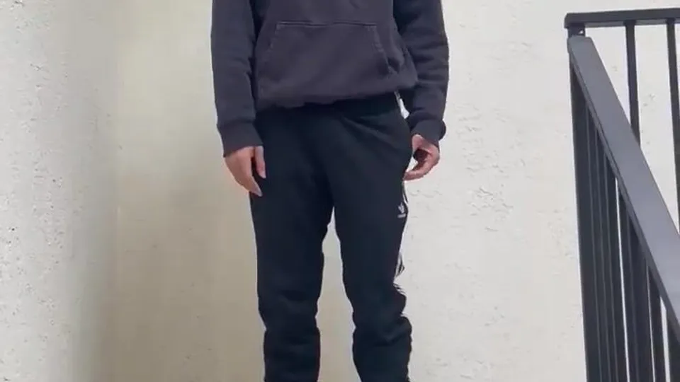 He is ordered to strip in the stairwell