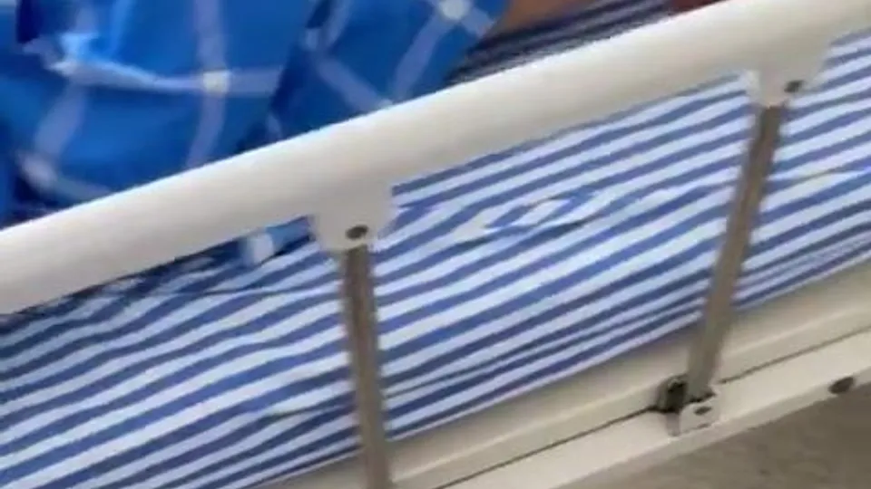 Helping a friend in the hospital bed