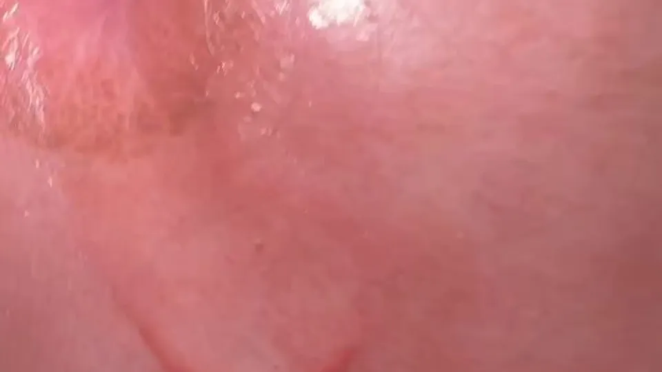 Hot closeup of baited Latino's tip