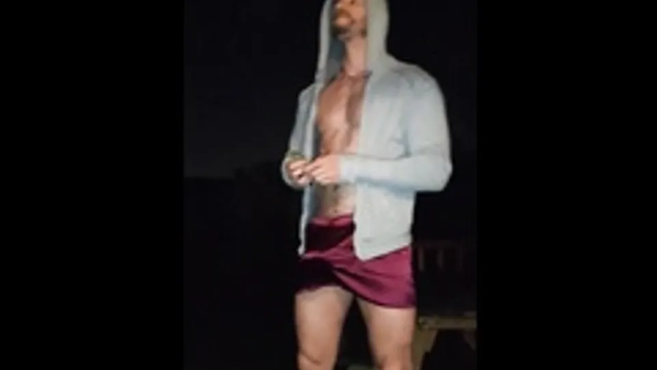Hot fit stud with an erection smoking a spliff on the porch.