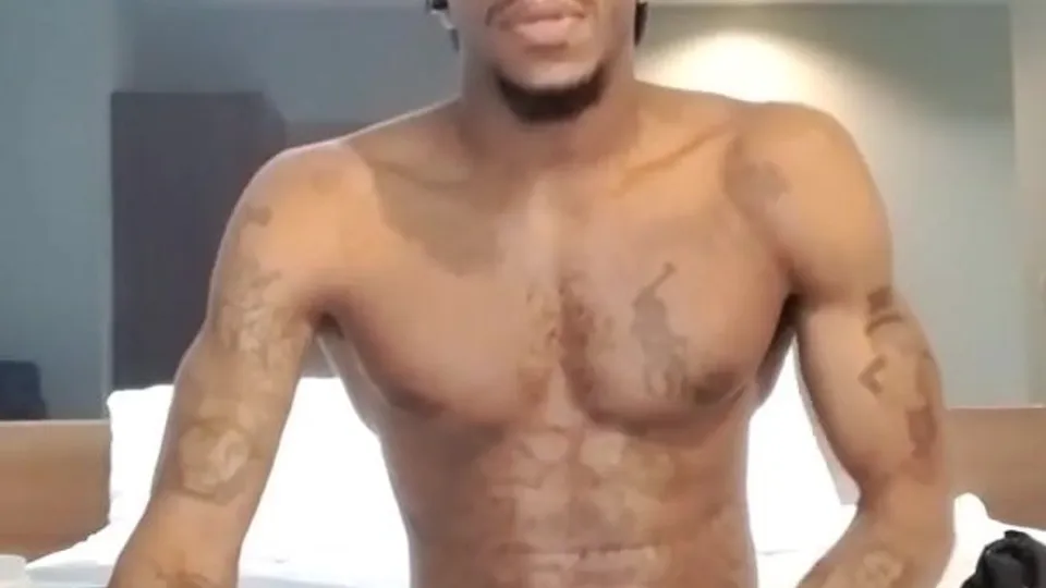 Muscular Black Man Smokes and Cums