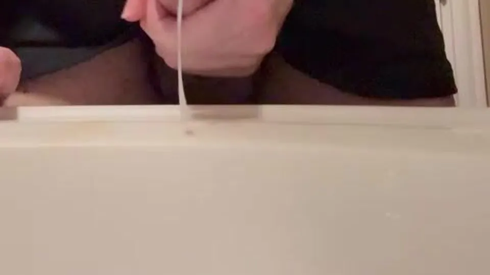 Jerking off and cumming in the sink...