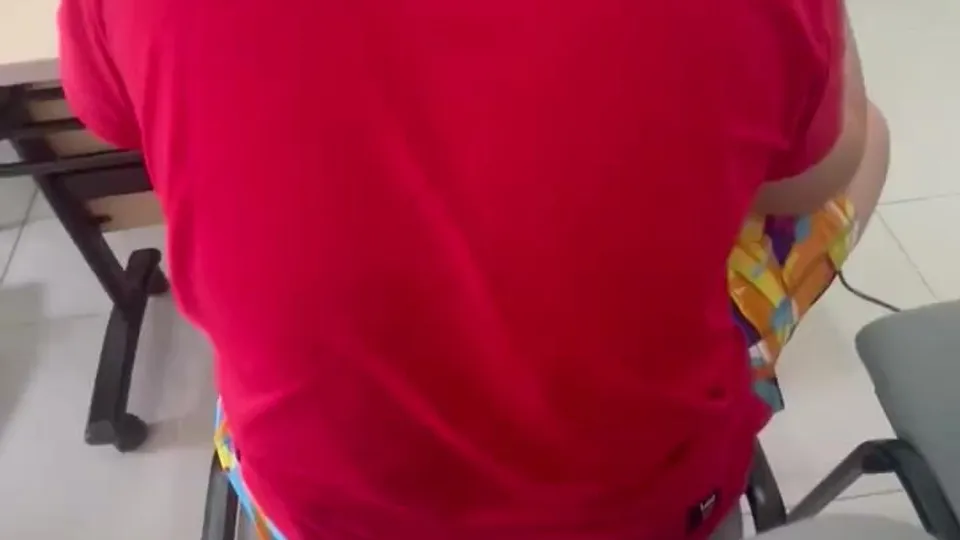 Jerking-off behind a guy in class. I don't see him cum, maybe he still orgasms.