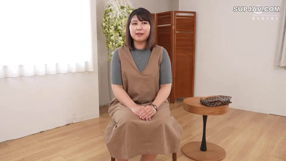 Asian Girl in Beige Dress Teases with Her Curves