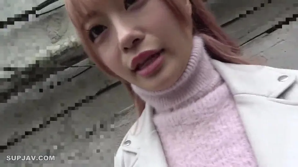 asian girl in pink outfit outdoors