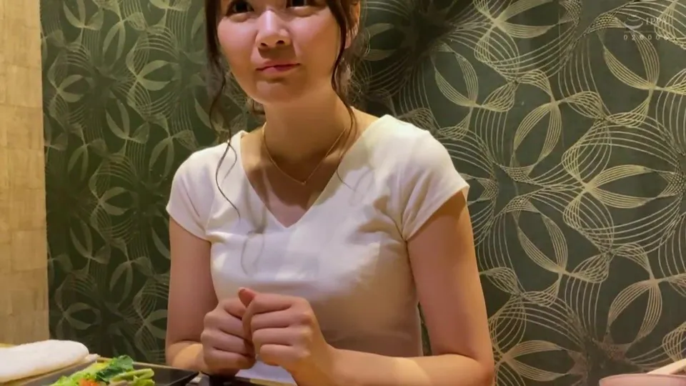 Asian Girl Eats Sushi in Stylish Cafe