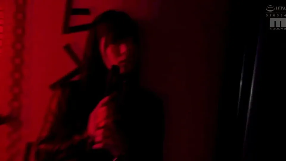 Dark Room Showdown: Gun-Wielding Beauty in Red Light