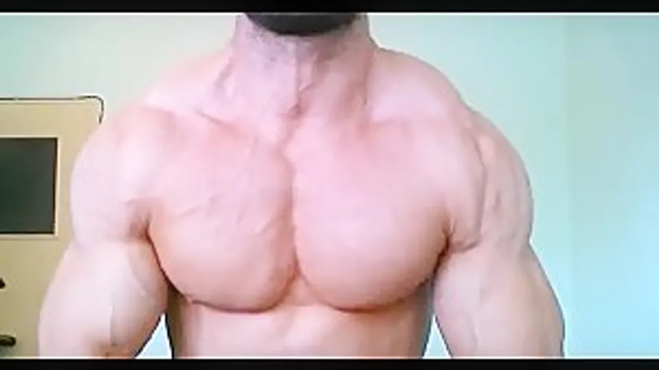 Muscle hunk flexing