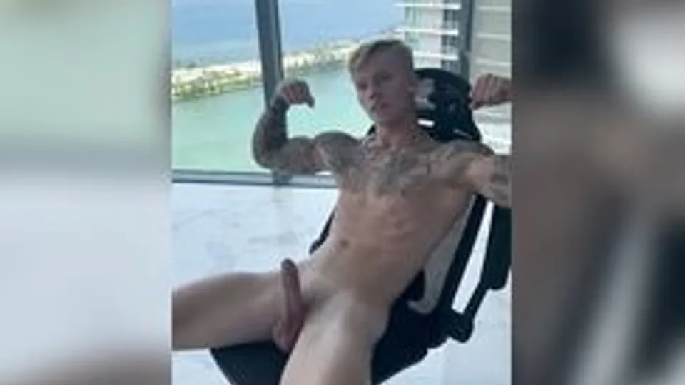 Muscular Jason jerking off on the balcony