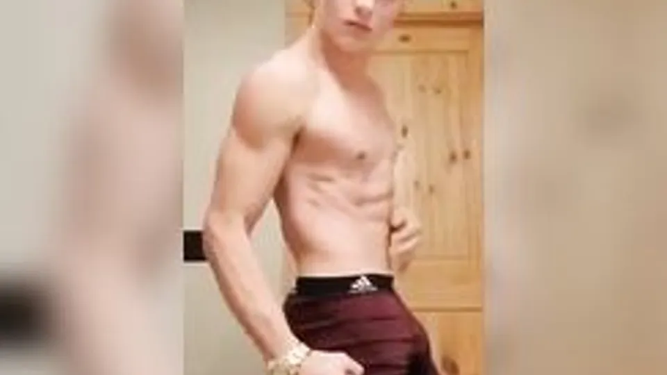 Muscular twink showing off his body
