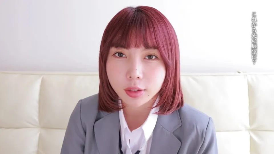 Red-haired Asian girl in school uniform seduces