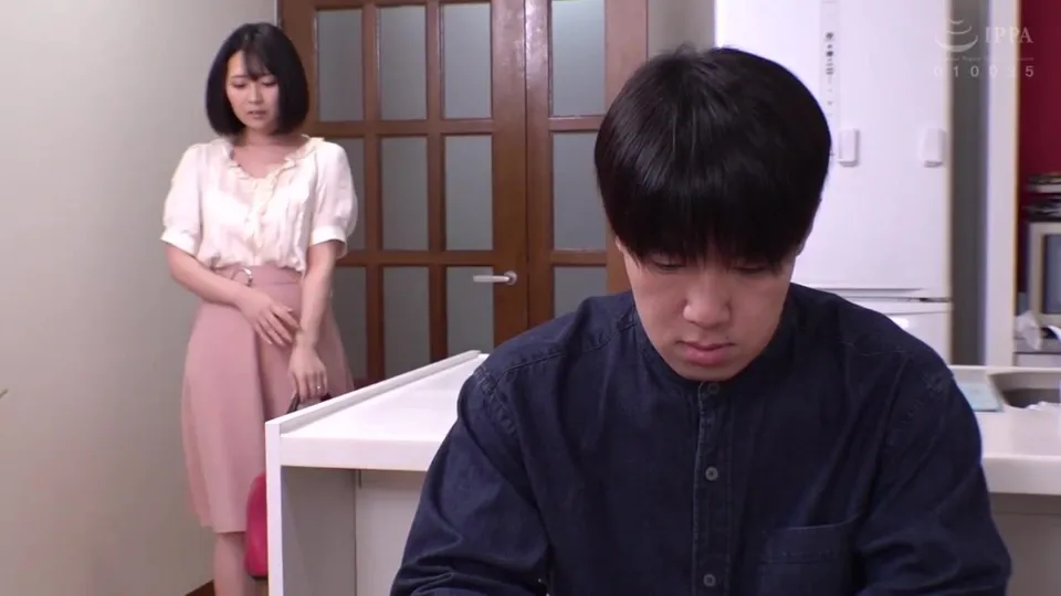 Asian couple in kitchen tension