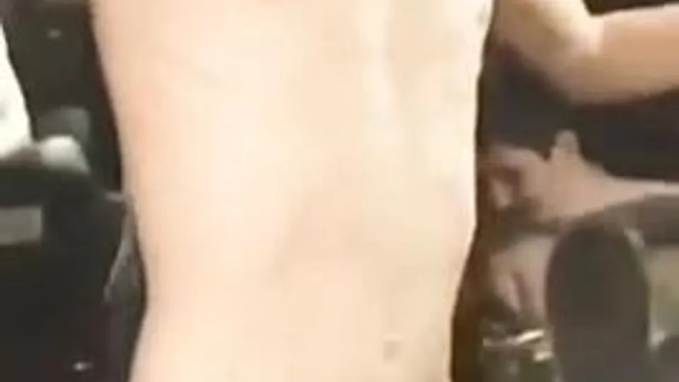 Naked  team mates having fun on the bus -