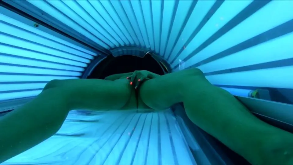 Nude Girl caresses herself in the solarium