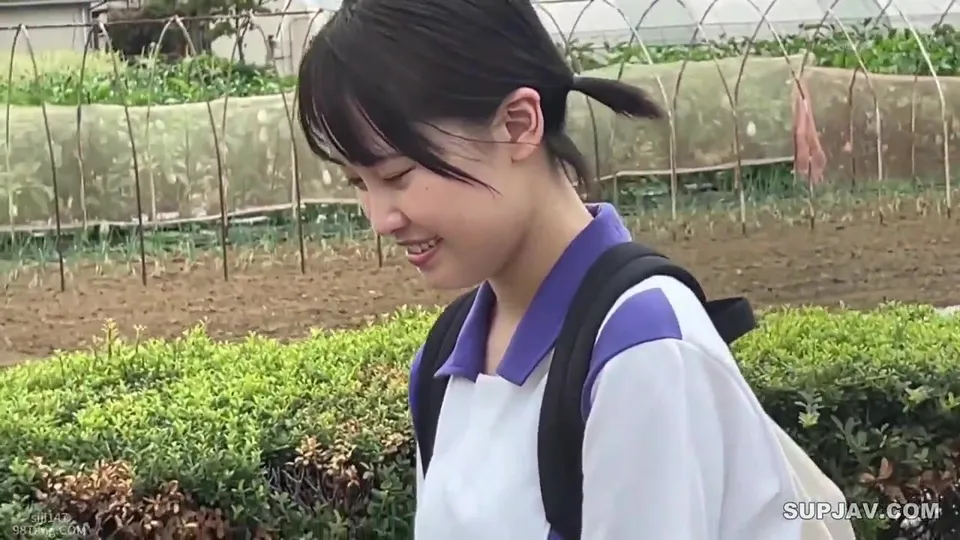asian schoolgirl posing in garden