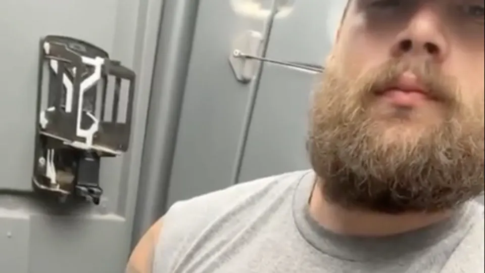 Redneck in the porta potty showing off his cock - ThisVid.com