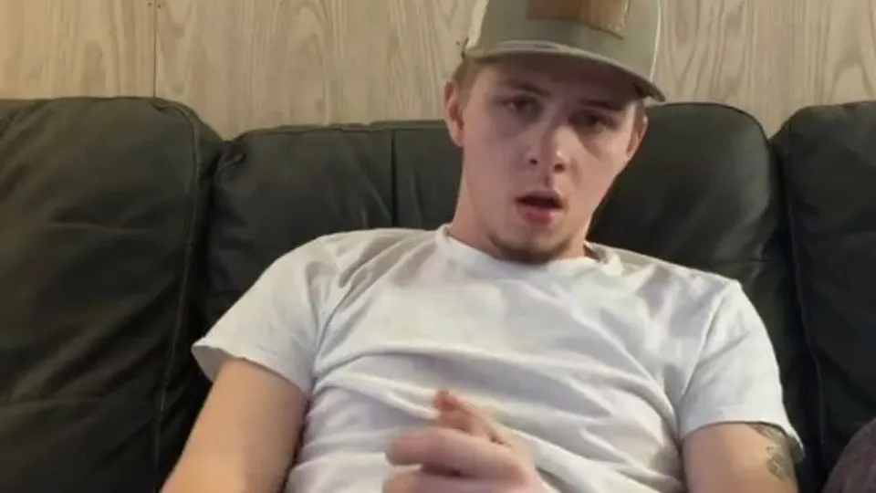 Redneck twink stroking his cock on the couch - ThisVid.com