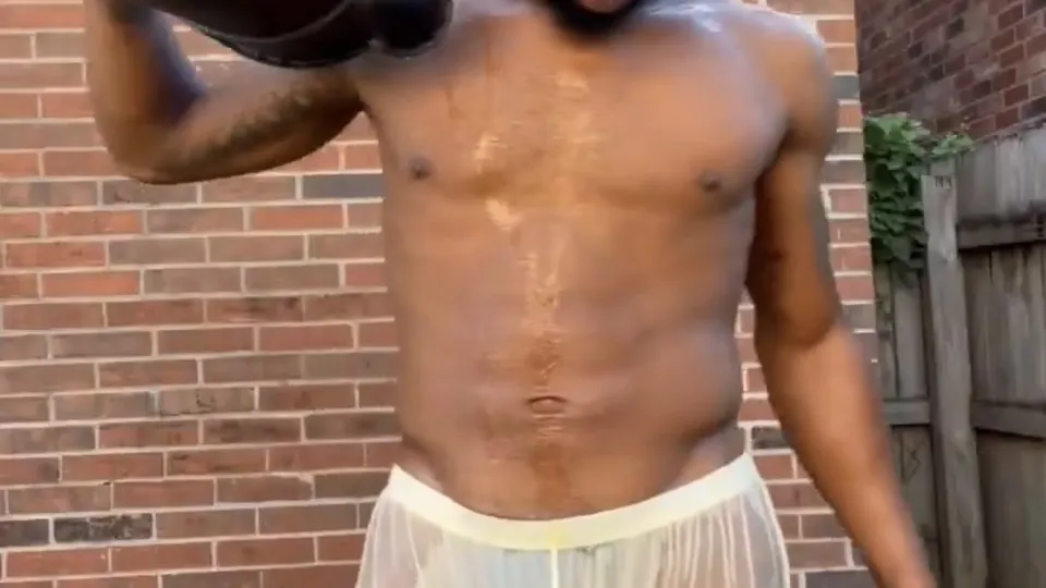 Refreshing bucket splash reveals thick meaty cock - ThisVid.com