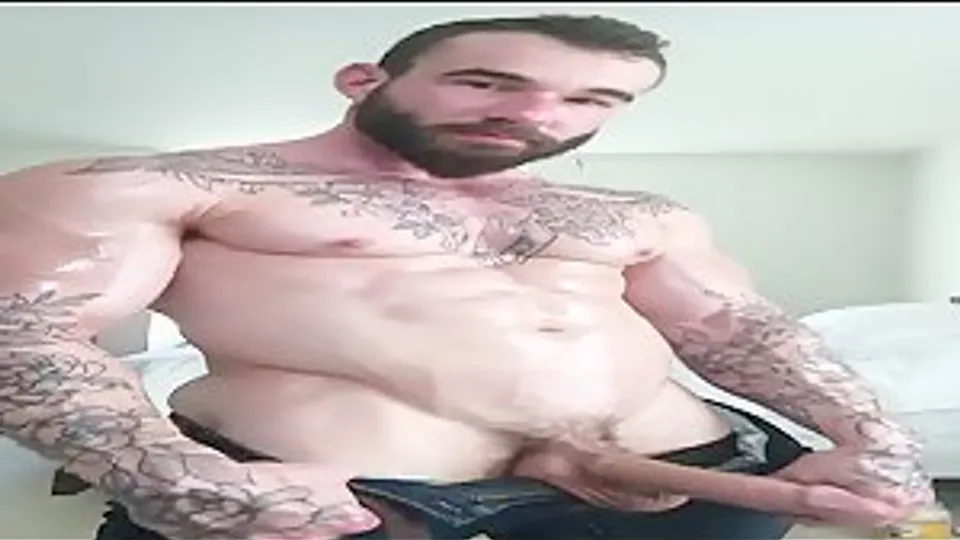 Rubbing oil over my big hard muscles and jerking off