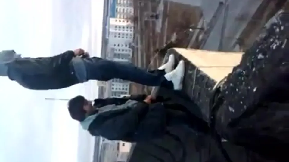 Russian daredevils 1eak from a roof - ThisVid.com