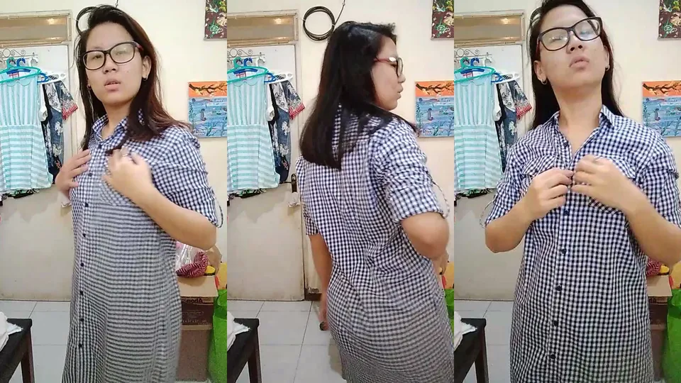 Schoolgirl Cecilia stripping off her button dress 