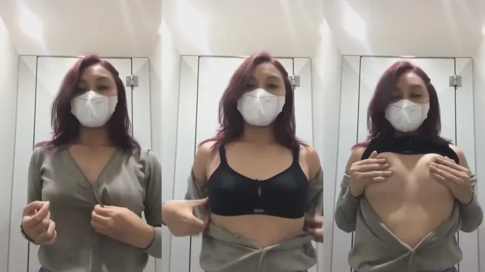 Selfie of foreign worker woman in locker room  