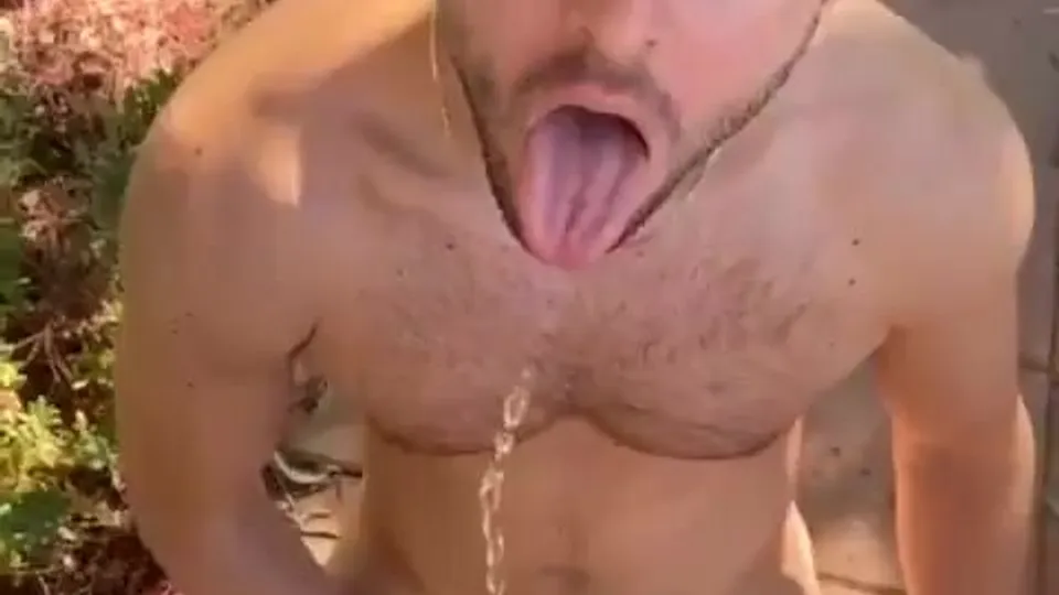 Sexy big dick guy pisses on fag outside - ThisVid.com