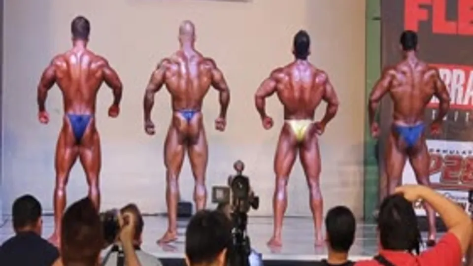 Sexy bodybuilder competes in a thong!