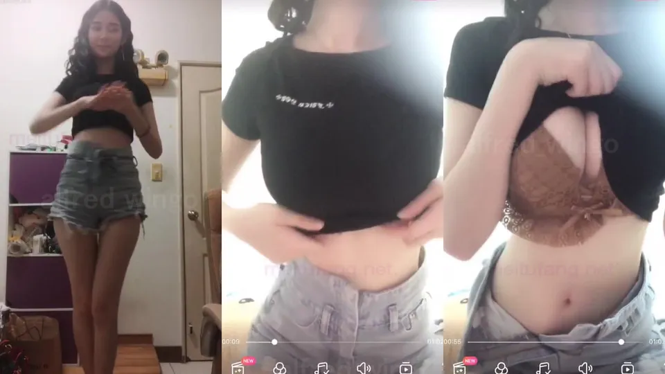 Sexy busty beauty dances and rubs her breasts for temptation 