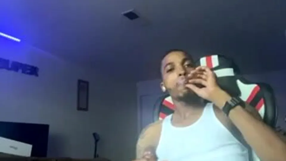 Sexy smoker stroking his big black dick - ThisVid.com