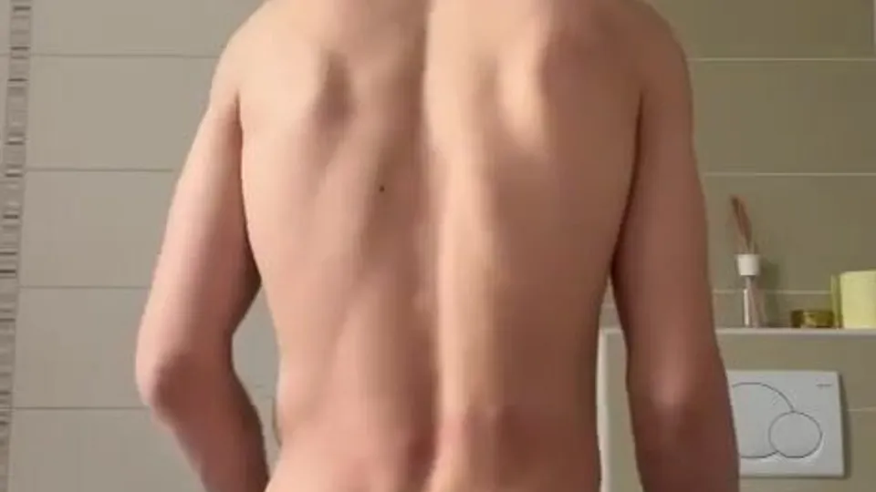 Shaved uncut muscle boy wiggles his ass