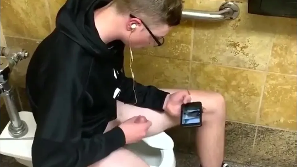 Young Man Wanks in Stall