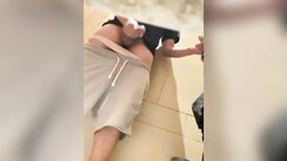 Spying on a young cumming guys in Asia's toilet