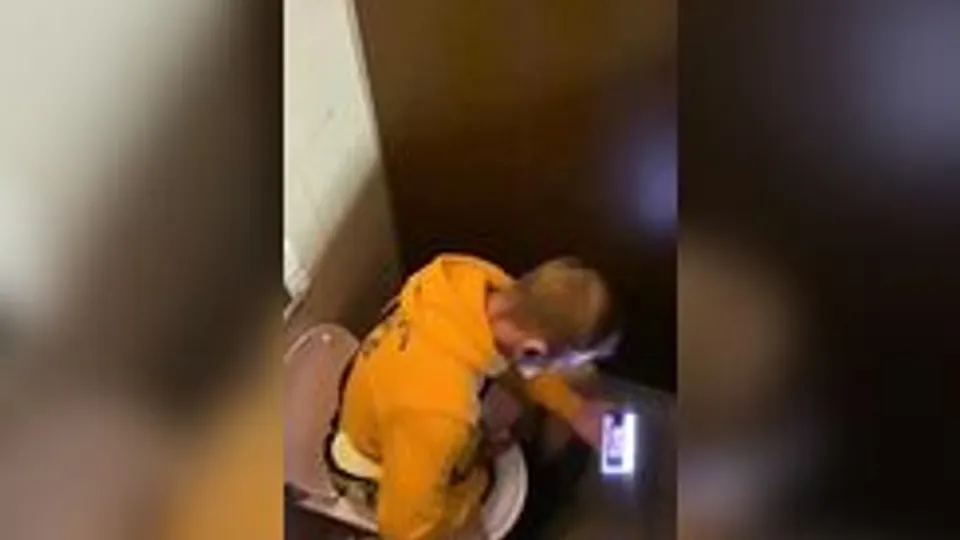 Spying on cocky guys jerking off in the toilet