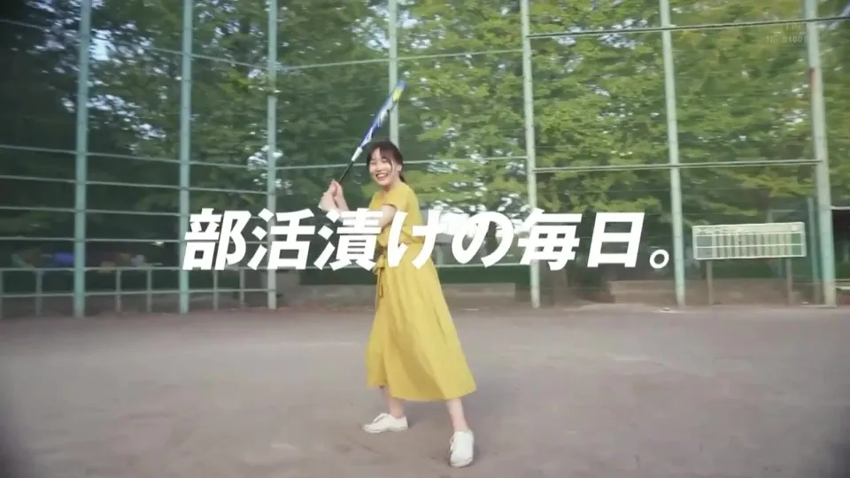 woman playing tennis in park