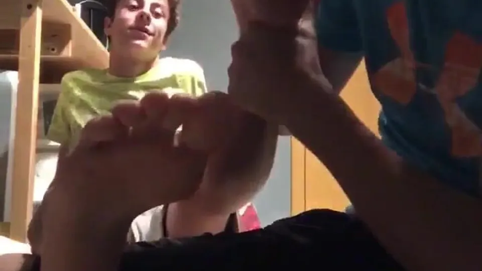 Straight boy lets friend lick his feet