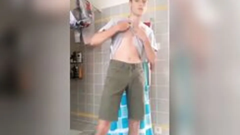Stripping down before a shower