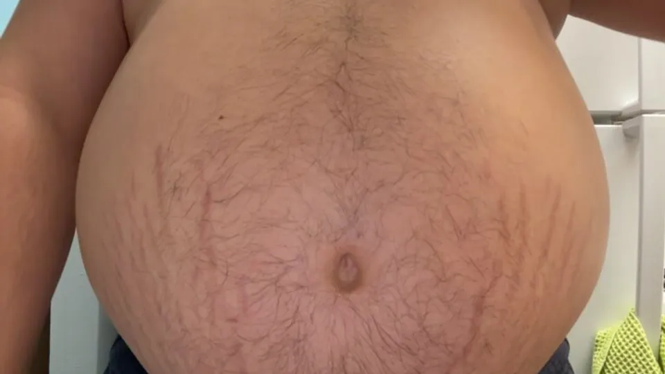 Stuffed exjock chugs milk - ThisVid.com