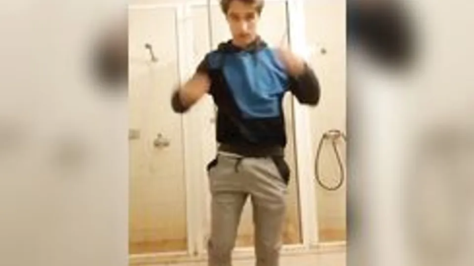 Stunningly beautiful twink jerks off like in public restroom. Great cum shot.