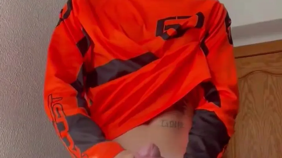 Tattooed Guy Teases Hard Cock While Pulling Down Shorts