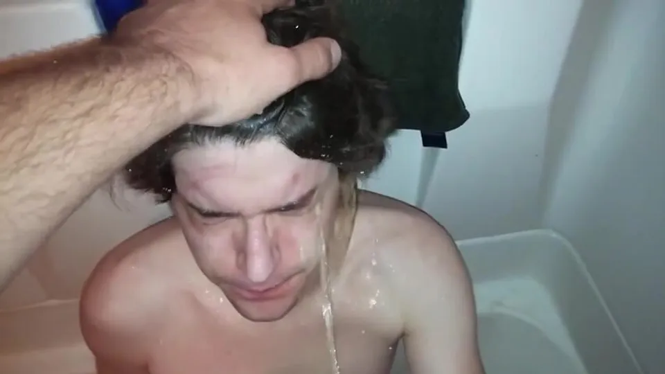 Teen jerks off as he is pissed on - ThisVid.com