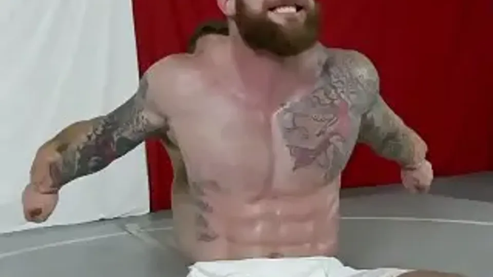 Muscular Men's Wrestling Match