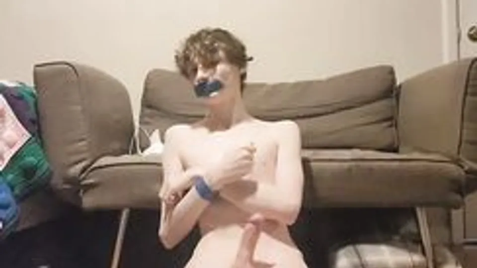 Tied boy pleasuring himself