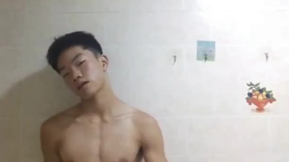 Toned hung asian boy shows off